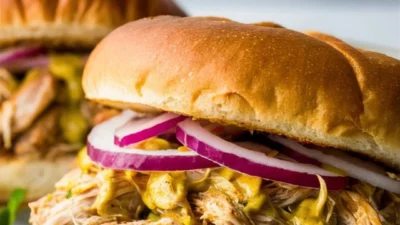 Savory Slow Cooker Honey Mustard Shredded Chicken Sandwich”